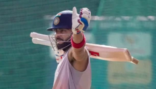 Kohli urges 120 effort to defend title, coach Flower confident